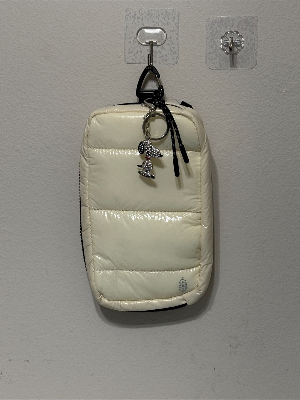 Free People Cream Quilted Crossbody Pouch with guitar strap for women on the go